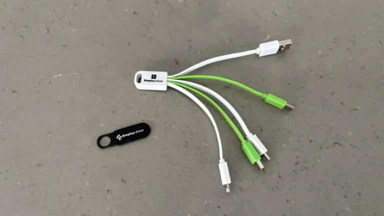 A webcam cover and 3-in-1 charging cable with the Employ-Ease logo printed on them.